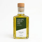 Fles TheWootz druivenpitolie van 250 ml voor houten snijplanken.